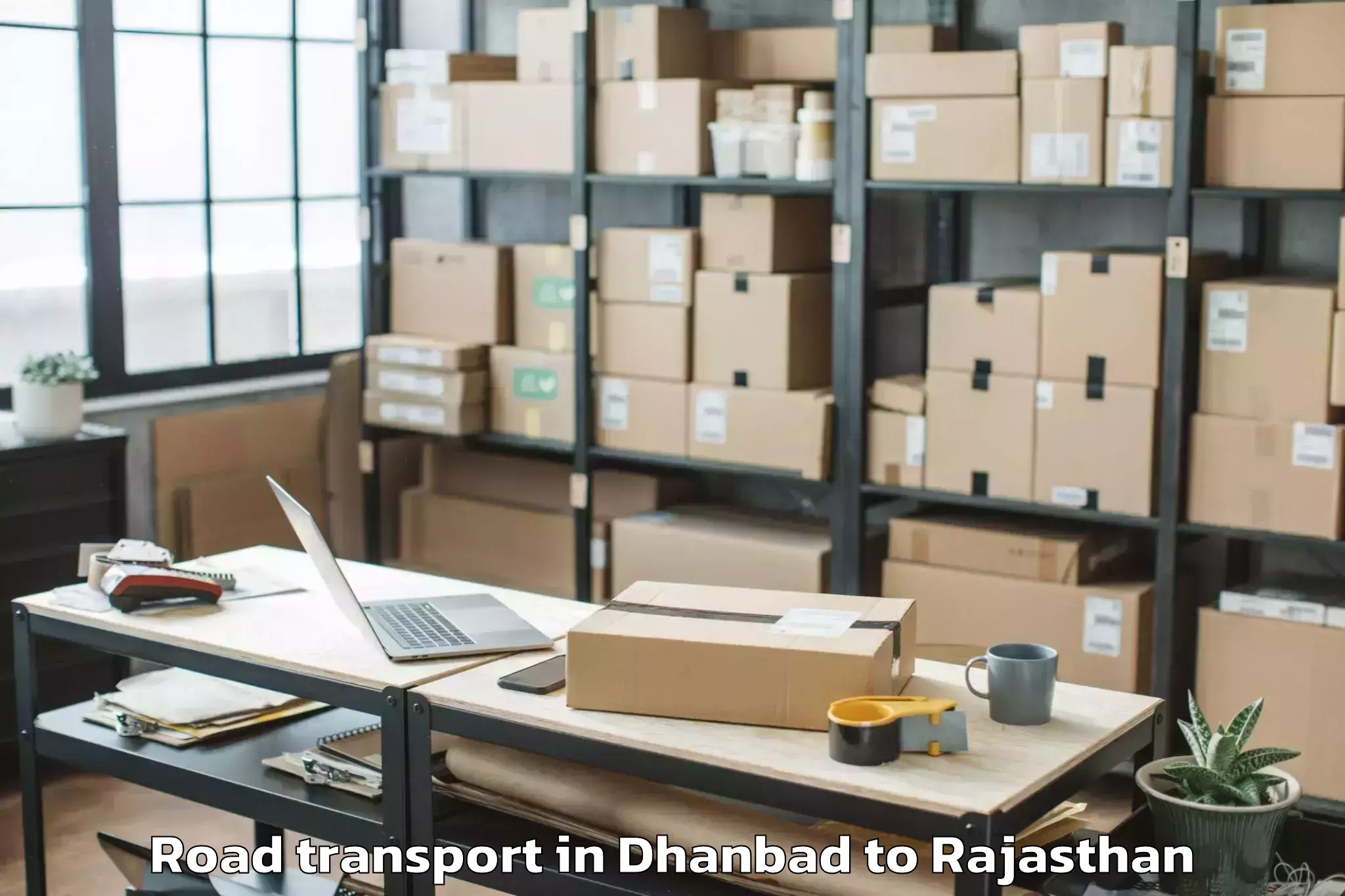 Book Dhanbad to Abhilashi University Jaipur Road Transport